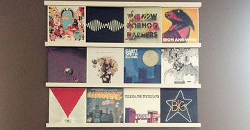 A collection of modern art on the vinyl shelf