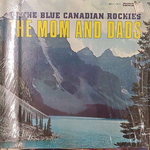 The Mom And Dads - In The Blue Canadian Rockies (LP, Album) - Funky Moose Records 2352407482-LOT002 Used Records