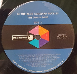 The Mom And Dads - In The Blue Canadian Rockies (LP, Album) - Funky Moose Records 2352407482-LOT002 Used Records